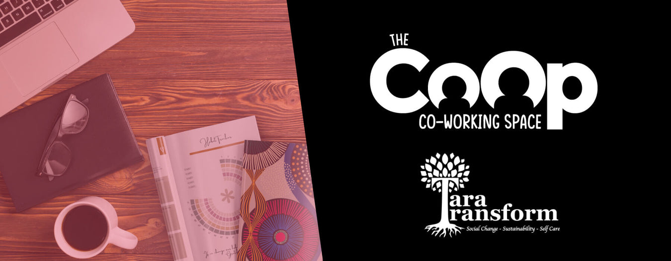 A desktop with a laptop, a cup of coffee and planner with a logo for the CoOp and Tara Transform