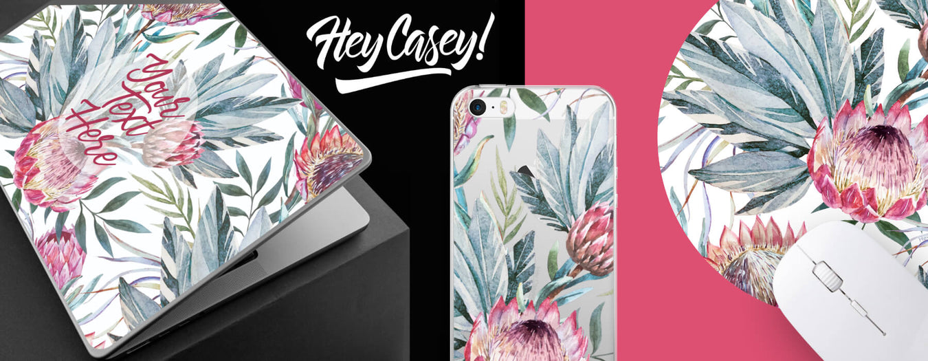 protea design on a laptop, a mobile phone and a mousepad from the Hello Casey range